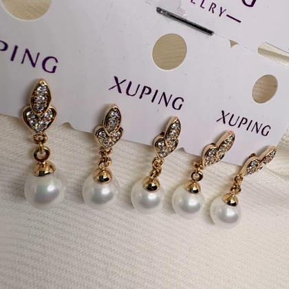 گوشواره ژوپینگ مدل «برگ و مروارید» | رقص مروارید زیر سایه درخشان