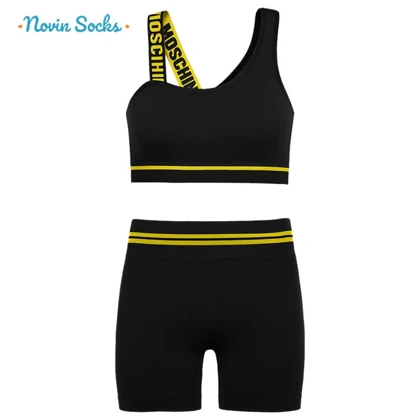 ست نیم‌تنه و شلوارک ورزشی زنانه مدل سیملس پشت چین‌دار کد 5562-2333