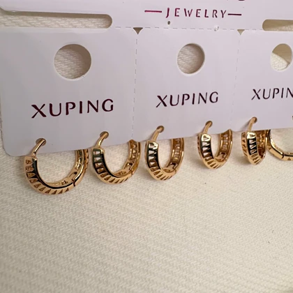 گوشواره حلقه‌ای ژوپینگ طرح «تراش هندسی» | بازی نور و سایه روی طلا