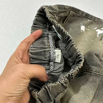 شلوار جین مام زاپ‌دار پشت جیب خرسی