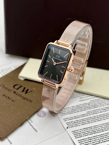 ساعت دنیل ولینگتون حصیری زنانه رزگلد صفحه مستطیل مشکی Daniel Wellington Rosegold