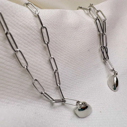 ست دستبند دو نفره مدل «قلب مگنتی» | زنجیر استیل کارتیر ظریف با پلاک مکمل