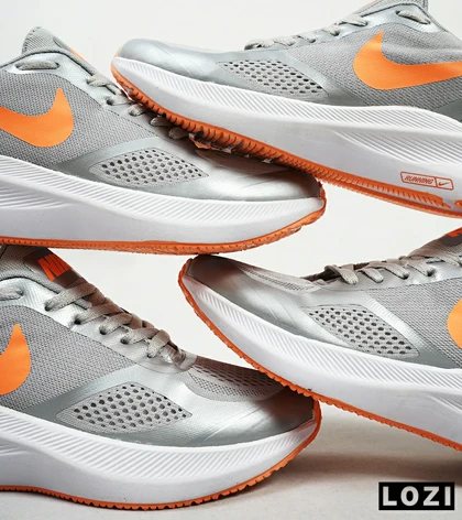 کفش کتانی مردانه طوسی نارنجی Nike guide 10