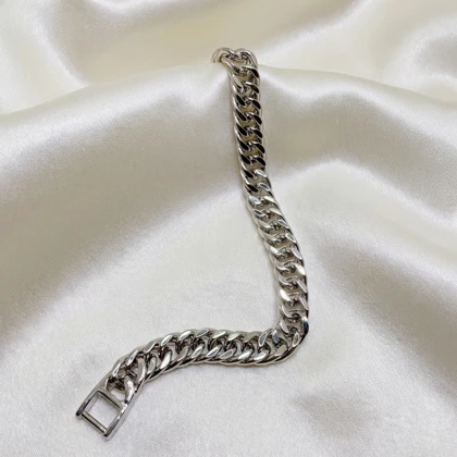 دستبند ژوپینگ طرح کارتیه (کوبان) نقره‌ای با قفل کتابی | یونیسکس