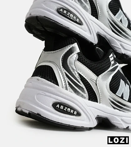 کفش کتانی مردانه و زنانه مشکی سفید NEW BALANCE 530