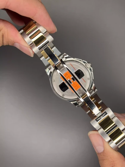 ساعت مچی لونژین کورنوگراف صفحه سرمه ای بند سیلور طلایی Longines