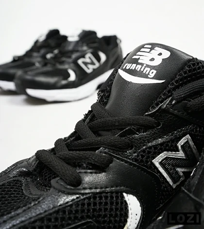 کفش کتانی زنانه و مردانه مشکی سفید NEW BALANCE 530 مدل 4124