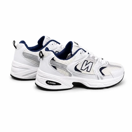 کتانی خارجی مردانه مدل نیوبالانس 530 سفید سرمه ای New Balance