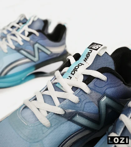 کفش کتانی مردانه و زنانه آبی مشکی NEW BALANCE More Trail v3