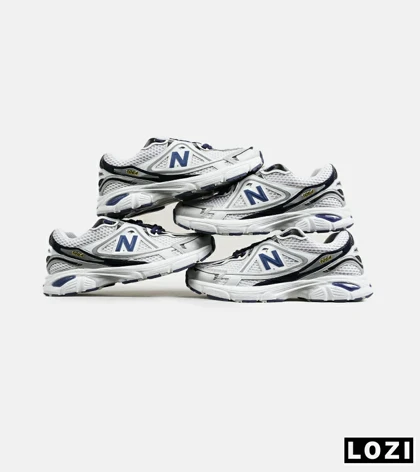 کفش کتانی مردانه و زنانه سفید سرمه ای NEW BALANCE 1064 V.2