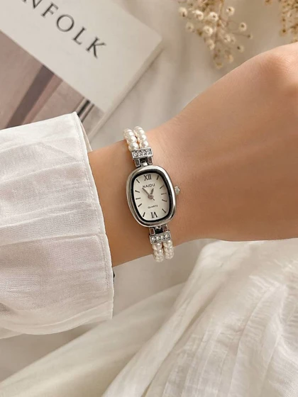 ساعت مچی زنانه نایدو بند مرواریدی استیل کد W516