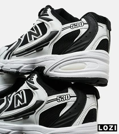 کفش کتانی مردانه و زنانه سفید مشکی NEW BALANCE 530