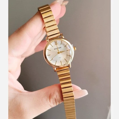 ساعت مچی زنانه کوشی شیشه الماسی بند استیل ریلیباتری اضافی