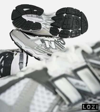 کفش کتانی طوسی سفید New Balance 1906R