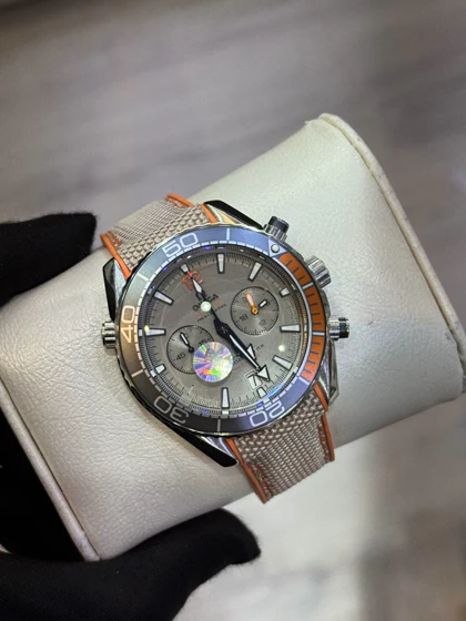 ساعت مردانه امگا سیمستر سه موتوره طوسی نارنجی