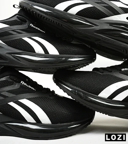 کفش کتانی مردانه و زنانه مشکی سفید Reebok مدل 4537