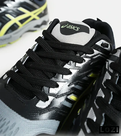 کفش کتانی مردانه مشکی طوسی لیمویی ASICS GT 2000