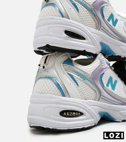 کفش کتانی مردانه و زنانه سفید آبی یاسی NEW BALANCE 530