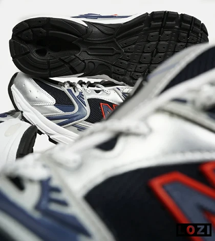کفش کتانی مردانه و زنانه طوسی مشکی سرمه ای NEW BALANCE 530