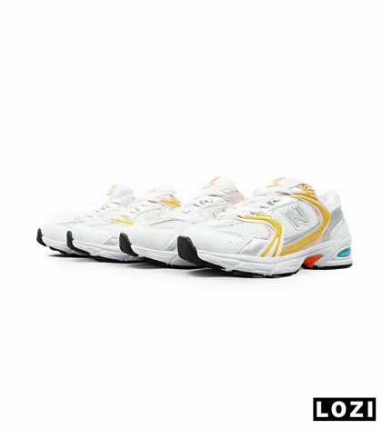 کفش کتانی زنانه صورتی زرد NEW BALANCE 530