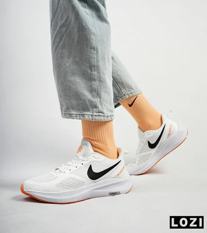 کفش کتانی مردانه سفید نارنجی Nike guide 10