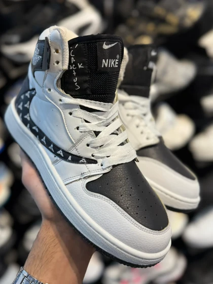 کتانی مردانه ترویس ساق‌دار سفید مشکی