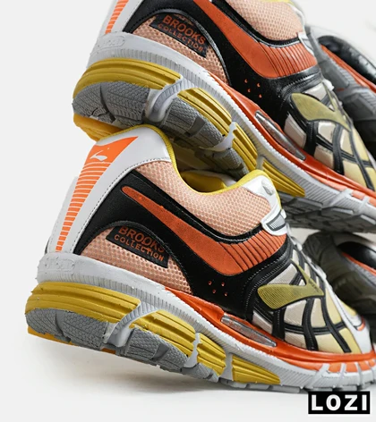 کفش کتانی بزرگ پا نارنجی زرد BROOKS adrenaline gts 22