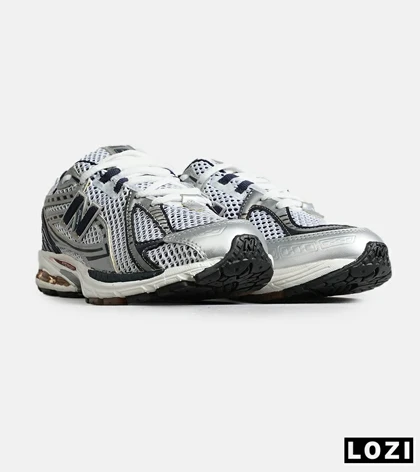 کفش کتانی مردانه و زنانه سفید سرمه ای NEW BALANCE 1064 مدل 8150