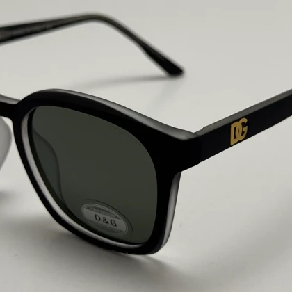 عینک آفتابی پلاریزه دولچه گابانا DOLCE GABBANA دسته سیم کشی شده لولا فنر فریم مشکی مات عدسی سبز کد 7709