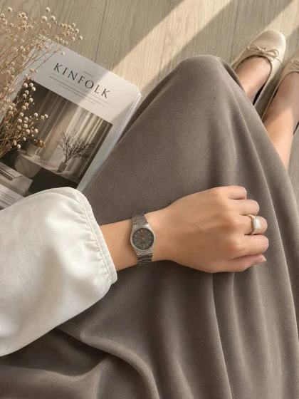 ساعت مچی زنانه بند استیل صفحه طوسی گارانتی