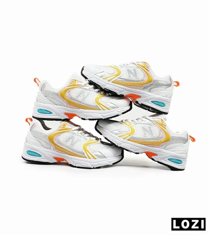 کفش کتانی زنانه صورتی زرد NEW BALANCE 530