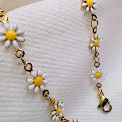 دستبند گل بابونه استیل طلایی