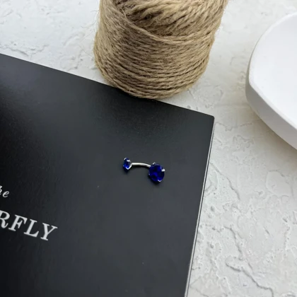 پیرسینگ ناف نگین‌دار استیل با جلوه زنانه