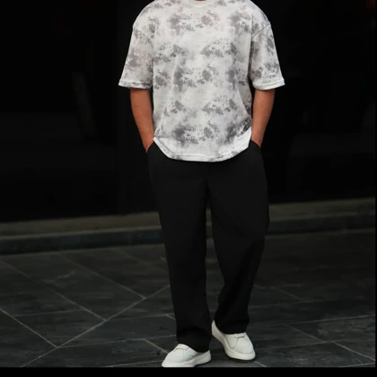 شلوار نیم بگ پارچه مازراتی مردانه مشکی پلیسه‌دار