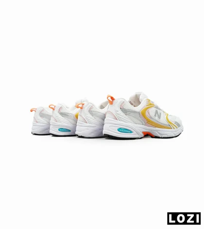 کفش کتانی زنانه صورتی زرد NEW BALANCE 530