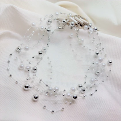 گردنبند نامرئی طرح «مروارید معلق» (Illusion Necklace) | مینیمال و اقتصادی