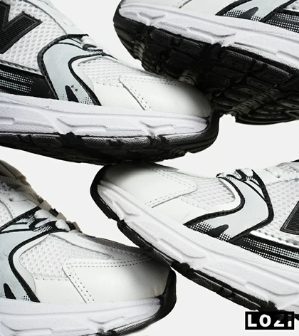 کفش کتانی مردانه و زنانه سفید طوسی مشکی NEW BALANCE 530