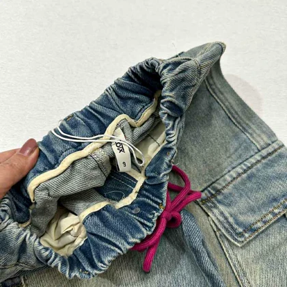 شلوار جین سنگ شور شده مام 6 جیب بند صورتی