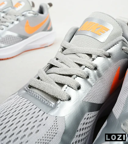 کفش کتانی مردانه طوسی نارنجی Nike guide 10
