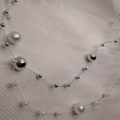 گردنبند نامرئی طرح «مروارید معلق» (Illusion Necklace) | مینیمال و اقتصادی