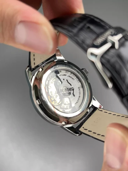 ساعت مچی اورینت اوپن هارت بند چرمی صفحه مشکی Orient