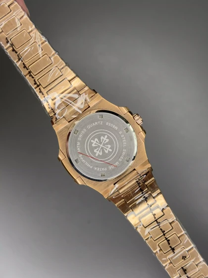 ساعت مچی پتک فیلیپ ناتیلوس صفحه سفید بند رزگلد Patek Philippe Nautilus