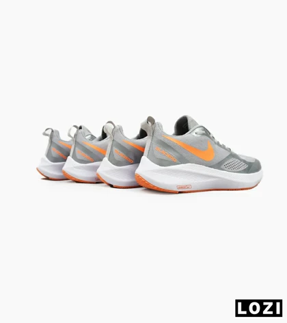 کفش کتانی مردانه طوسی نارنجی Nike guide 10