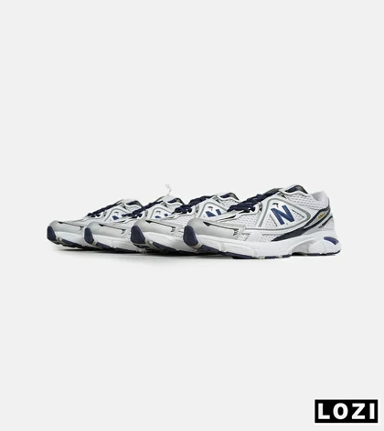 کفش کتانی مردانه و زنانه سفید سرمه ای NEW BALANCE 1064 V.2