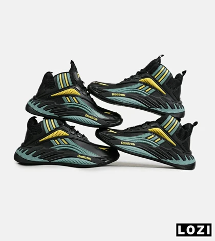 کفش کتانی ساق‌دار مشکی فیلی زرد Reebok Shaq Attaq