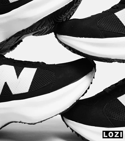 کفش کتانی مردانه مشکی سفید NEW BALANCE 547