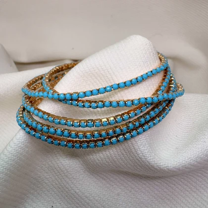 دستبند تنیسی مدل «فیروزه درخشان» | آبی مات بر پایه طلایی (فروش دانه‌ای)