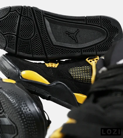 کفش کتانی ساق‌دار مردانه مشکی زرد Nike air jordan 4
