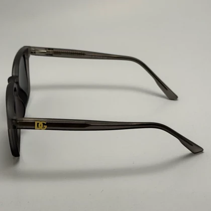 عینک آفتابی پلاریزه دولچه گابانا DOLCE GABBANA دسته سیم کشی شده لولا فنر طوسی کد 7709