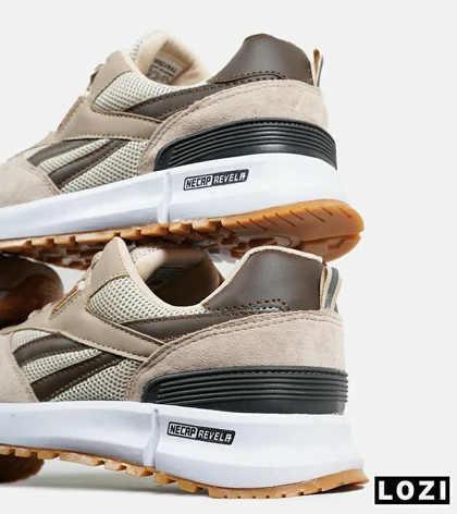 کفش کتانی قهوه ای کرم REEBOK Unphased Pro مدل 6371